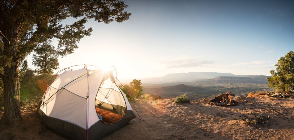 1649776469439015228.jpg tent-camping-under-a-pinon-tree-in-the-desert-first-royalty-free-image-1645542991.jpg